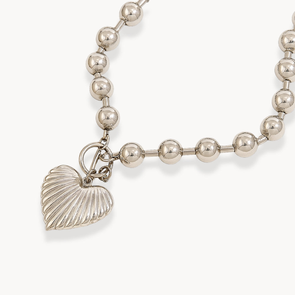 Collier à boucle en perles en forme de cœur